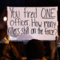 Protesters march down Rice St. a day after police released the body cam footage of a St. Paul police officer shooting a nude unarmed black man who was being attacked by a K9. The officer was fired by the force.