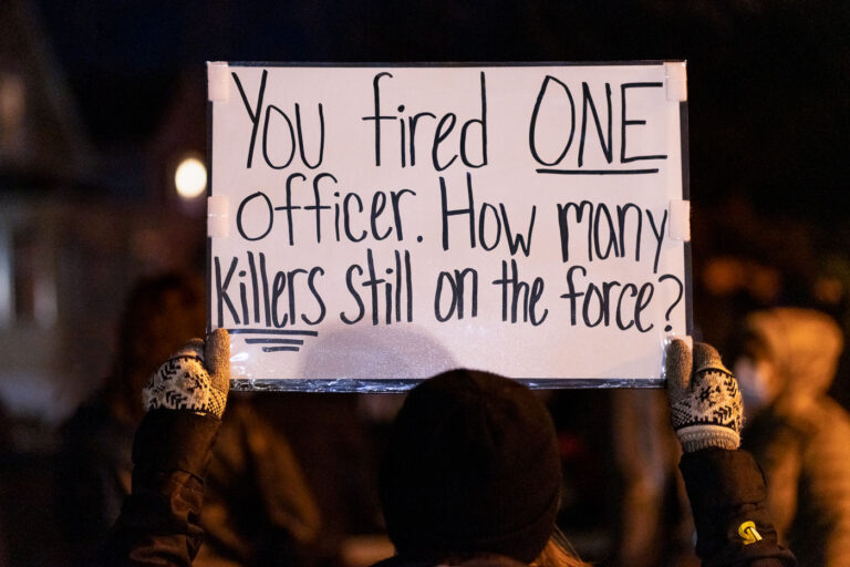How many killers still on force? 1 Protesters march down Rice St. a day after police released the body cam footage of a St. Paul police officer shooting a nude unarmed black man who was being attacked by a K9. The officer was fired by the force.