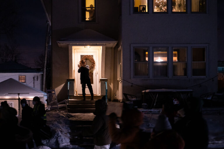 Neighborhood march after Dolal Idd killing 2 A neighbor comes out to show his support as protesters march down 17th Ave the night after Dolal Idd was killed by Minneapolis Police.
