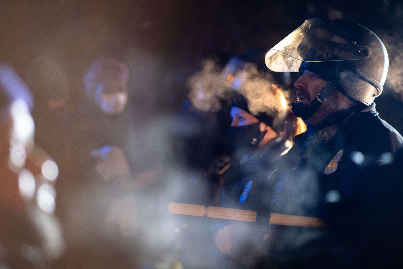 Police officer outside the Dolal Idd crime scene