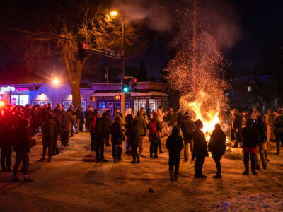 Protesters around a street fire on E 36th St, Minneapolis