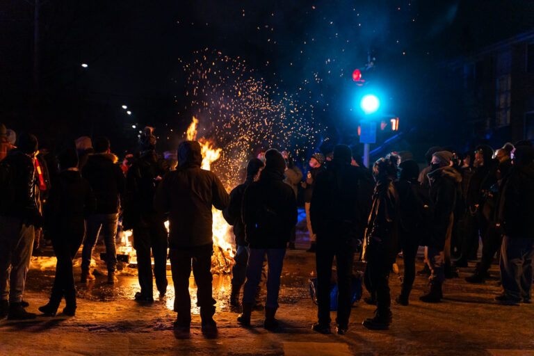 Protesters around a fire after Dolal Idd is killed 1 Protesters gather at 36th and Cedar after the Minneapolis Police shoot and kill Dolal Idd. Earlier in the year George Floyd was killed by Minneapolis Police about a mile away.