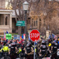 "Stop The Steal" protesters and the Minnesota State Patrol outside the Minnesota Governor's Residence in St. Paul on December 5, 2020.