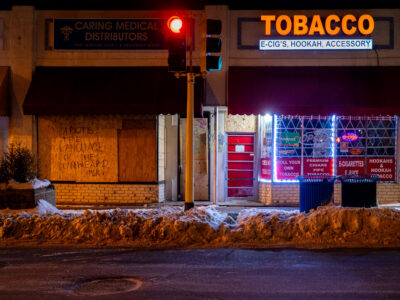 Nicollet Mall boarded storefront with graffiti, Minneapolis