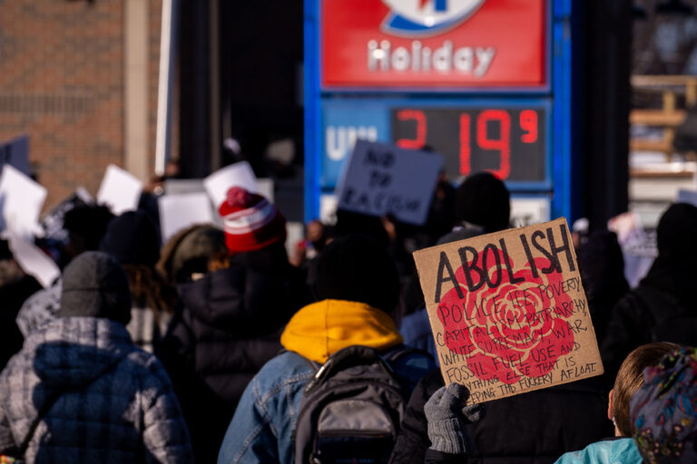 Abolish Police Ice Poverty protest sign 1 Around a thousand protesters gathered outside of the Holiday Gas station at Cedar and 36th in South Minneapolis seeking justice for Dolal Idd. Dolal Idd was shot and killed by Minneapolis Police on December 30th, 2020 during a traffic stop. This was the first police officer killing since George Floyd a mile away on May 25th, 2020.