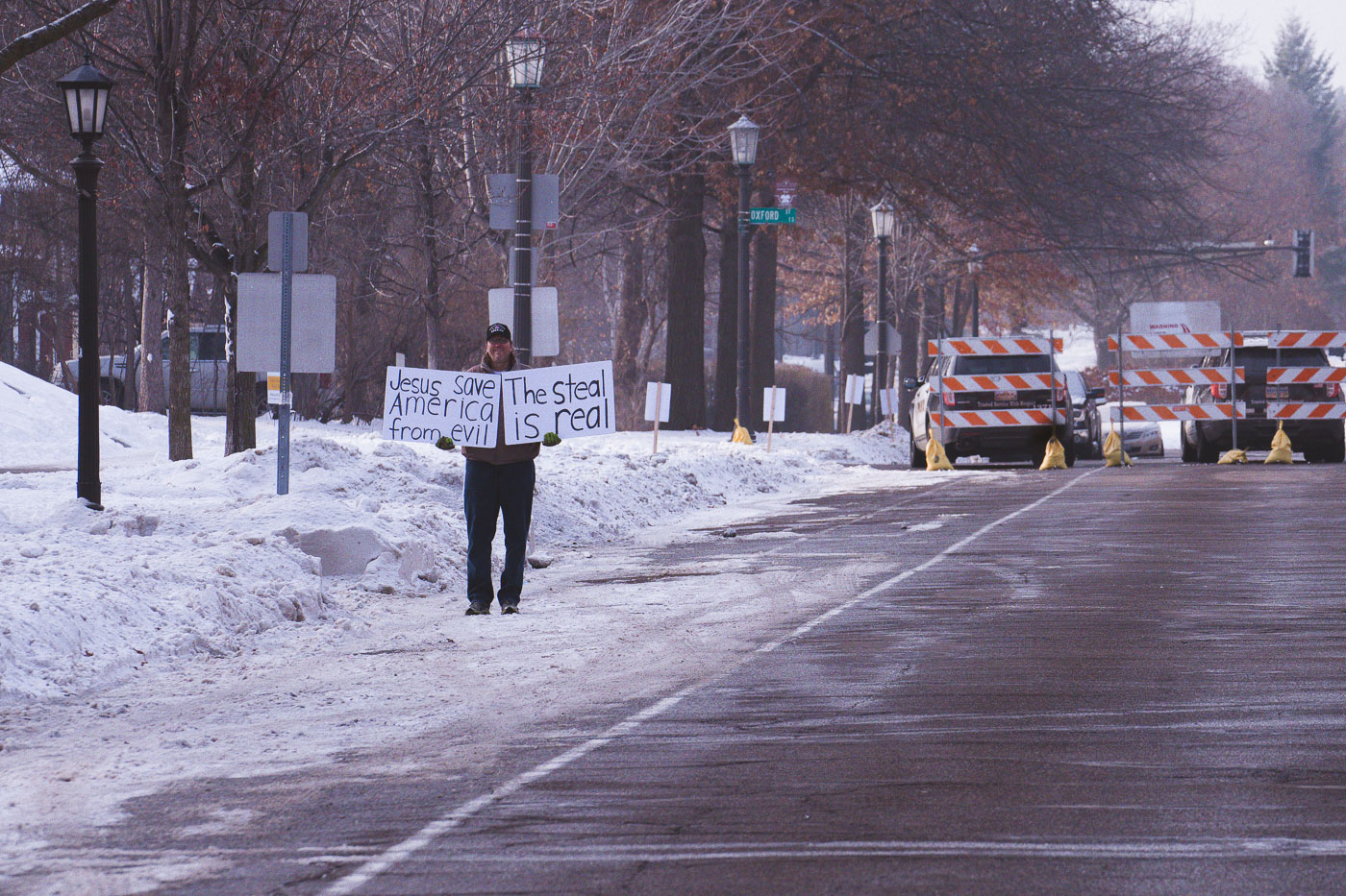 Jesus Save America From Evil protest sign