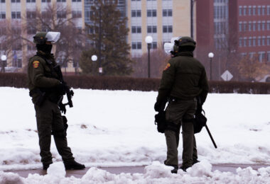 Law enforcement guards the Minnesota State Capitol.