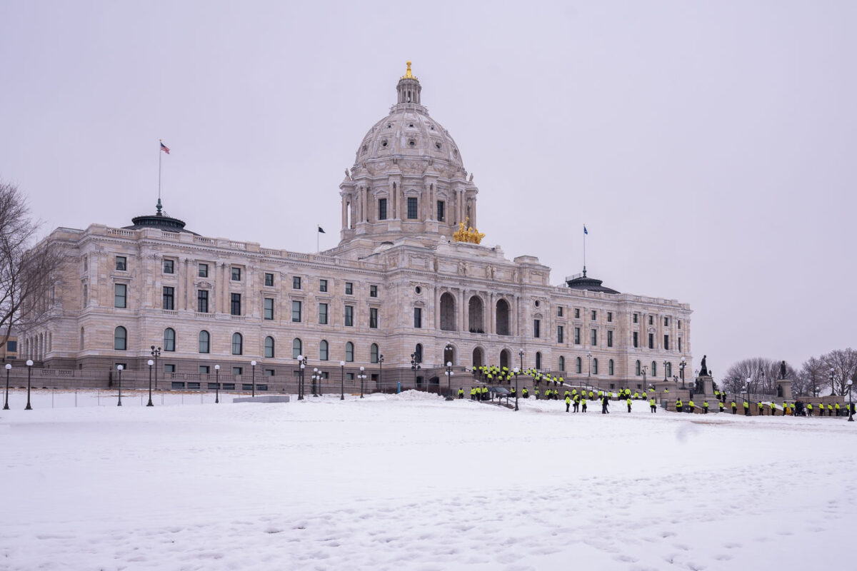 Minnesota State Patrol guards the State Capitol on reports of possible protests following a January 6th, 2021 insurrection at the United States Capitol. 3 Trump supporters at a rally.