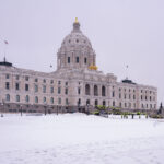 Minnesota State Patrol guards the State Capitol on reports of possible protests following a January 6th, 2021 insurrection at the United States Capitol. 3 Trump supporters at a rally.