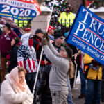 Trump supporters gather at the Minnesota Governor’s Residence after a “Storm The Capitol” event at the Minnesota State Capitol.
