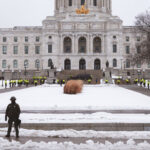 Minnesota law enforcement surround the Minnesota State Capitol about 10 days after the attack on the United States Capitol.