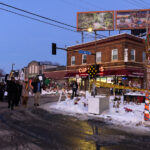 Protesters march to George Floyd Square from where Dolal Idd was killed about a mile away.