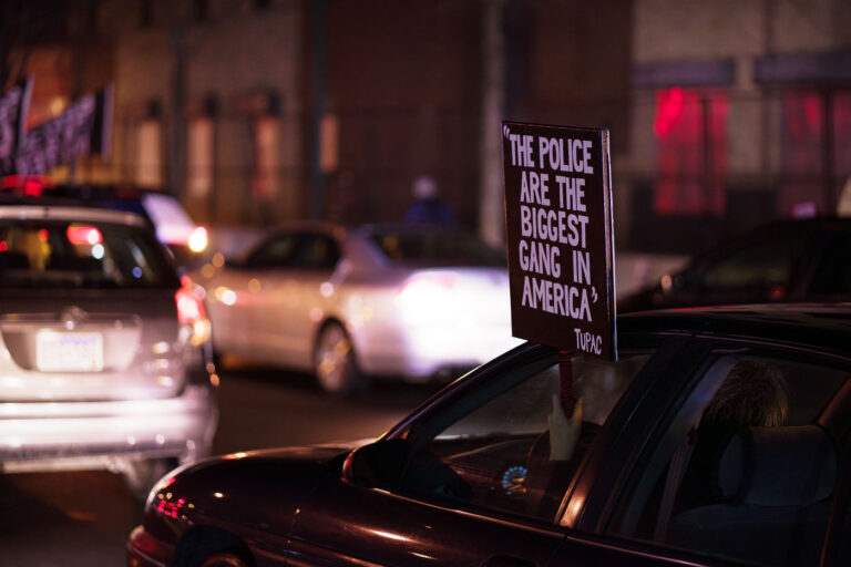 The Police Are The Biggest Gang in America 2 100 protesters marched on Inauguration Day from South High to the 3rd precinct. Among the demands were for Biden to reverse Trump climate change & environmental policies and community control of police.