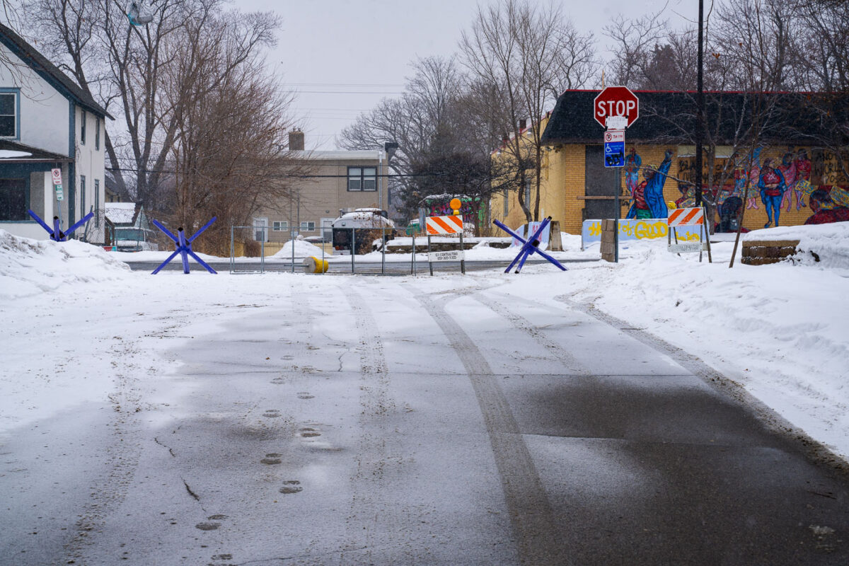 Barricades at George Floyd Square on what was the 56th anniversary of the death of Malcom X.