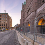 Fencing and barricades begin going up around Minneapolis City Hall. The layers of fencing and barriers are going up with 20 days remaining before jury selection begins in the George Floyd Trial.