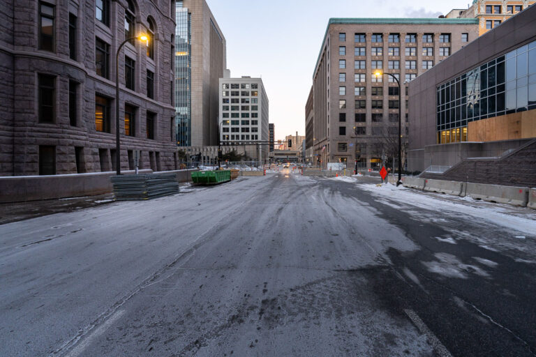 Minneapolis City Hall and Hennepin County Jail Security Fencing 4 Security fencing and concrete barriers surround Minneapolis City Hall and the Hennepin County Jail in anticipation of the Derek Chauvin murder trial. The extensive security measures were put in place in early 2021 to manage potential public gatherings and ensure the safety of the courthouse and surrounding areas. This response reflected the heightened tensions in Minneapolis following the murder of George Floyd and the subsequent protests.