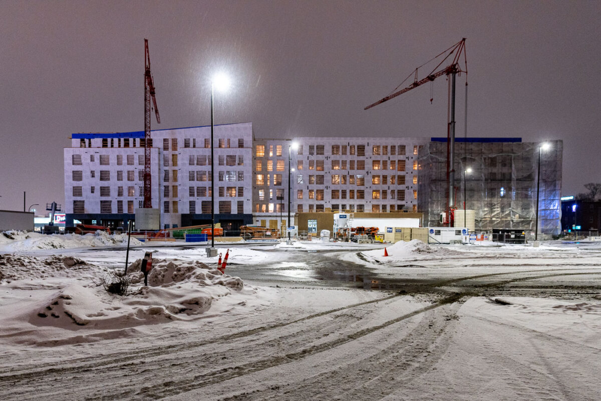 The rebuilding of the Midtown Corner six-story apartment building. It was still under construction when it burned during unrest. It’s located a block away from the Minneapolis Police third precinct.