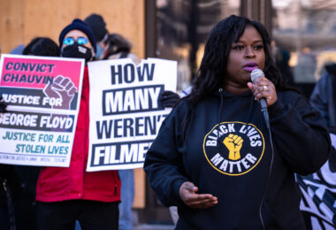 Activists held a press conference this afternoon outside the government center to announce a March 8th protest. They say the fortification of government buildings and acting like the people are the problem is not going to stop this community from demanding justice and change.