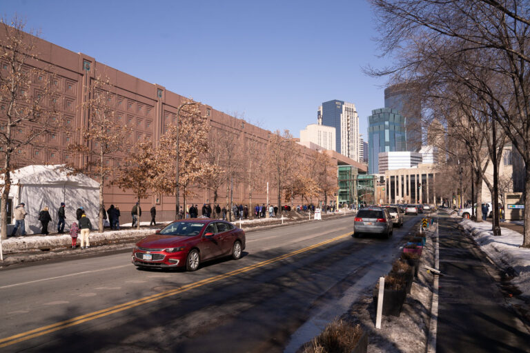 COVID-19 Minneapolis Convention Center 1 People stand in line for their turn to get the COVID-19 vaccine at the Minneapolis Convention Center.