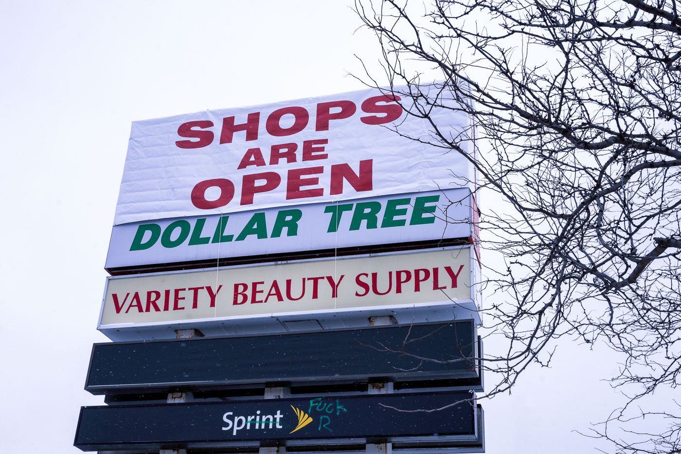 Shops Are Open sign on Lake Street February 2021