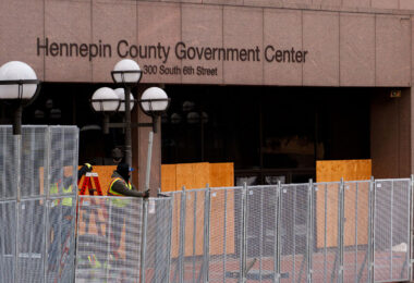 Fencing continues to go up around the government center in preparation for Derek Chauvin's murder trial.
