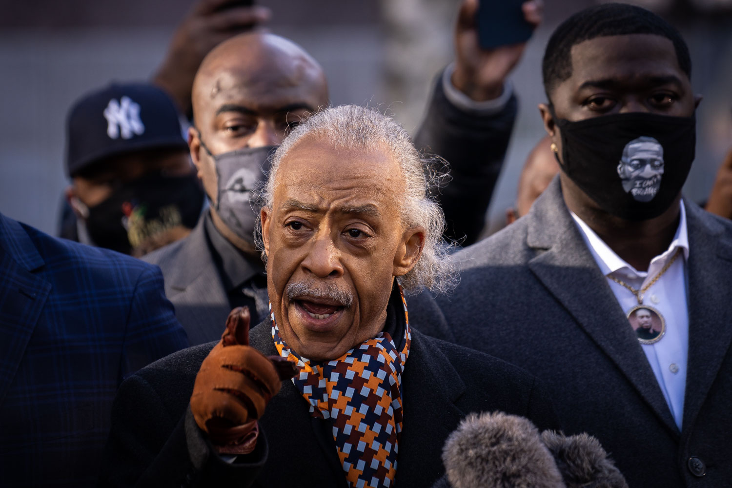 Rev Al Sharpton speaks outside the Hennepin County Government Center where opening statements of the Derek Chauvin trial were set to begin. He's joined by George Floyd's brothers Philonise and Terrence Floyd.