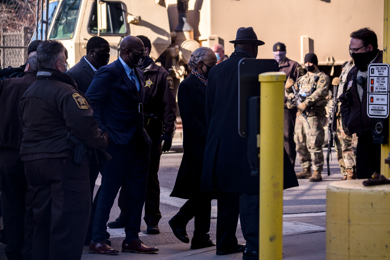 George Floyd family, their attorney Ben Crump and Rev. Al Sharpton arrive to a heavily fortified Hennepin County Government center on the day of opening statements in the murder trial of Derek Chauvin. Chauvin is charged in the May 25th murder of George Floyd.