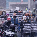 Protesters march around the Hennepin County Government Center. The courthouse is currently holding the Derek Chauvin murder trial. Chauvin is charged in the May 25th murder of George Floyd in South Minneapolis.