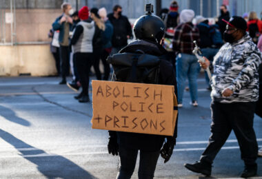 Protesters gathered outside the Hennepin County Government Center prior to the 8am start of the Derek Chauvin trial. Former Minneapolis Police Officer Derek Chauvin is charged in the murder of George Floyd on May 25th, 2020.