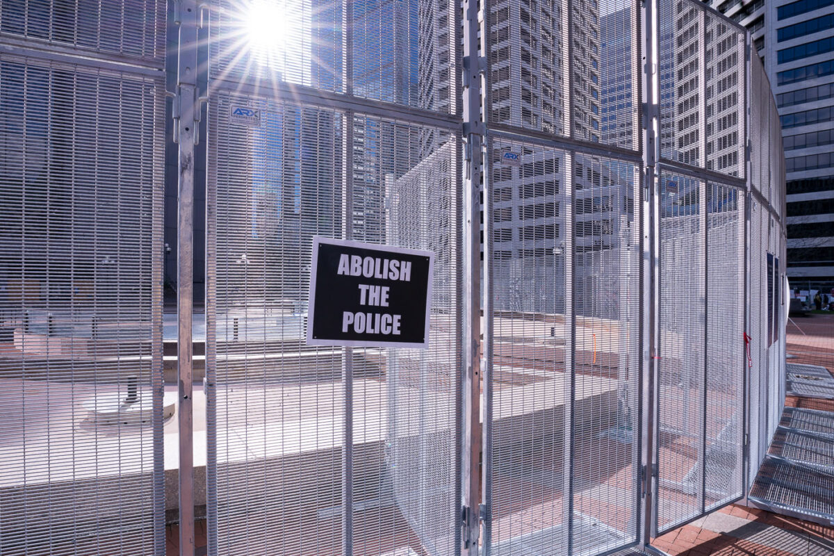 An Abolish The Police protest sign on the security fencing around the Hennepin County Government Center where Derek Chauvin is on trial for the May 25, 2020 murder of Geroge Floyd in South Minneapolis.