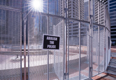 An Abolish The Police protest sign on the security fencing around the Hennepin County Government Center where Derek Chauvin is on trial for the May 25, 2020 murder of George Floyd in South Minneapolis.