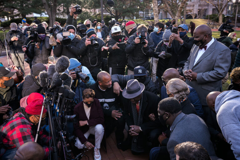 Al Sharpton, Ben Crump, George Floyd family kneels 4 March 29, 2021 - Minneapolis -- Ben Crump, the attorney for the George Floyd, Rev. Al Sharpton, and George Floyd Family take a kneel for 8:46 outside the Hennepin County Government Center prior to opening statements began in the Derek Chauvin murder trial. Chauvin is accused of murdering George Floyd on May 25th, 2020.