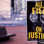 All Eyez on Justice protest sign 1 All Eyez On Justice, Justice for George Floyd flyer seen outside the courthouse where Derek Chauvin is being tried for murder on March 29, 2021.