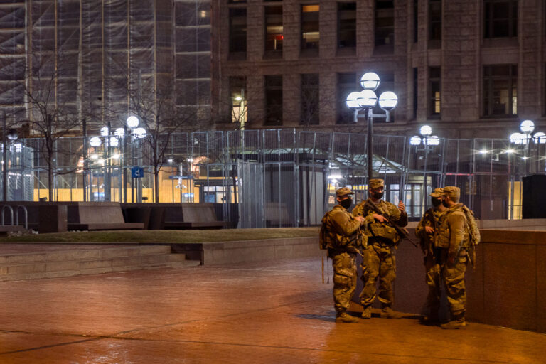 National Guard outside Hennepin County Government Center, Minneapolis 3 National Guard soldiers stand outside the Hennepin County Government Center in Minneapolis on March 7, 2021. Their presence was in response to the ongoing trial of Derek Chauvin, the former Minneapolis police officer charged in the murder of George Floyd. The trial, which began in March 2021, drew significant public attention and protests, leading to heightened security measures in the city.