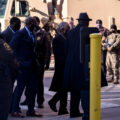 George Floyd family, their attorney Ben Crump and Rev. Al Sharpton arrive to a heavily fortified Hennepin County Government center on the day of opening statements in the murder trial of Derek Chauvin. Chauvin is charged in the May 25th murder of George Floyd.