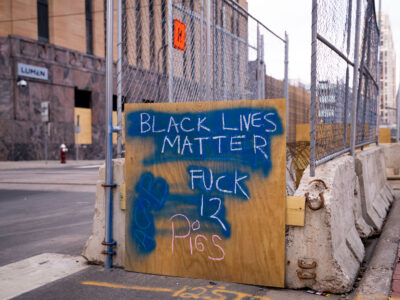 Minneapolis Government Center Fencing with Protest Art