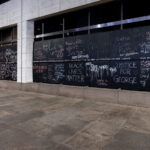 US Bank Plaza, across from the Government Center, put up black boards which prompted people to bring chalk. They've been somewhat of an ongoing messageboard that continuously changes.