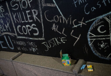 Chalk laying outside a building across the street from the Hennepin County Government Center where the trial of Derek Chauvin has begun. Chauvin is charged in the May 25th, 2020 murder of George Floyd.