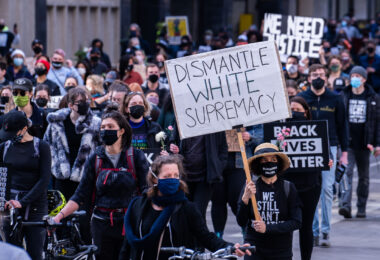 Thousands march the day before the start of jury selection in the Derek Chauvin murder trial. The former Minneapolis Police officer is charged with the murder of George Floyd on May 25th, 2020.