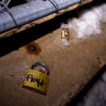 Locks with the names of police violence victims were placed on fencing around the Government Center where Derek Chauvin is on trial for the murder of George Floyd. A day later they were cut off.