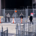 A man speaks through the fence to the Minnesota National Guard during the Derek Chauvin murder trial.