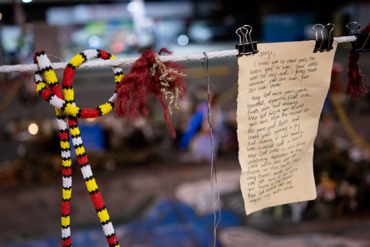 A letter to George hanging at the George Floyd Memorial.