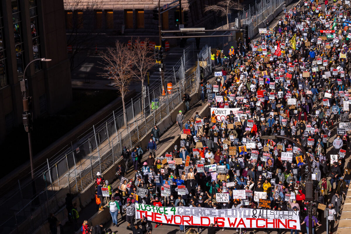 Protesters gathered outside the Hennepin County Government Center prior to the 8am start of the Derek Chauvin trial. Former Minneapolis Police Officer Derek Chauvin is charged in the murder of George Floyd on May 25th, 2020.