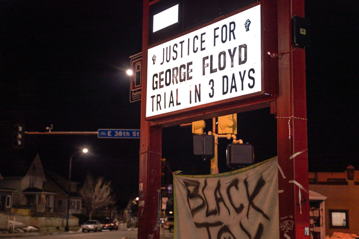 Justice for George Floyd. Trial in 3 days on the sign at The People's Way in George Floyd Square.