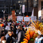 Protesters gathered outside the Hennepin County Government Center prior to the 8am start of the Derek Chauvin trial. Former Minneapolis Police Officer Derek Chauvin is charged in the murder of George Floyd on May 25th, 2020.