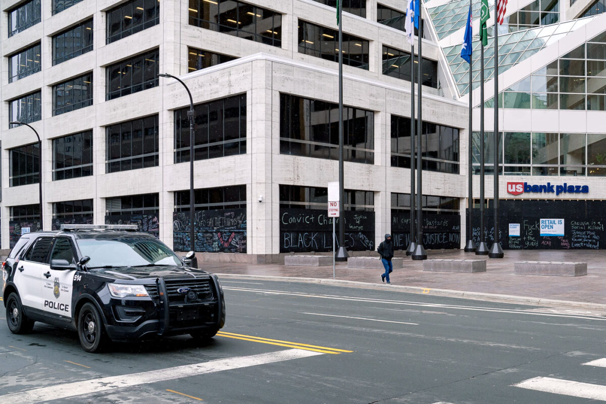 A Minneapolis Police squad drives down 3rd Ave in Downtown Minneapolis.