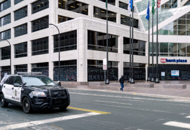 A Minneapolis Police squad drives down 3rd Ave in Downtown Minneapolis.