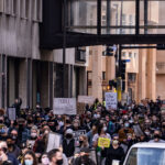 Thousands march the day before the start of jury selection in the Derek Chauvin murder trial. The former Minneapolis Police officer is charged with the murder of George Floyd on May 25th, 2020.