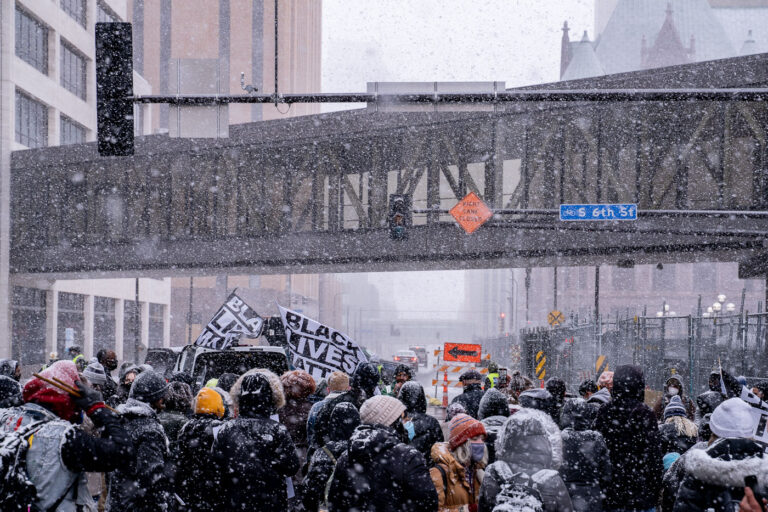 Protest in the snow outside Chauvin trial in Minneapolis 2 Protesters march around the Hennepin County Government Center demanding a fair jury selection process in the Derek Chauvin trial.