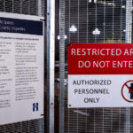 Signage on secure fencing around the government center. The Derek Chauvin trial is set to begin on March 8th.